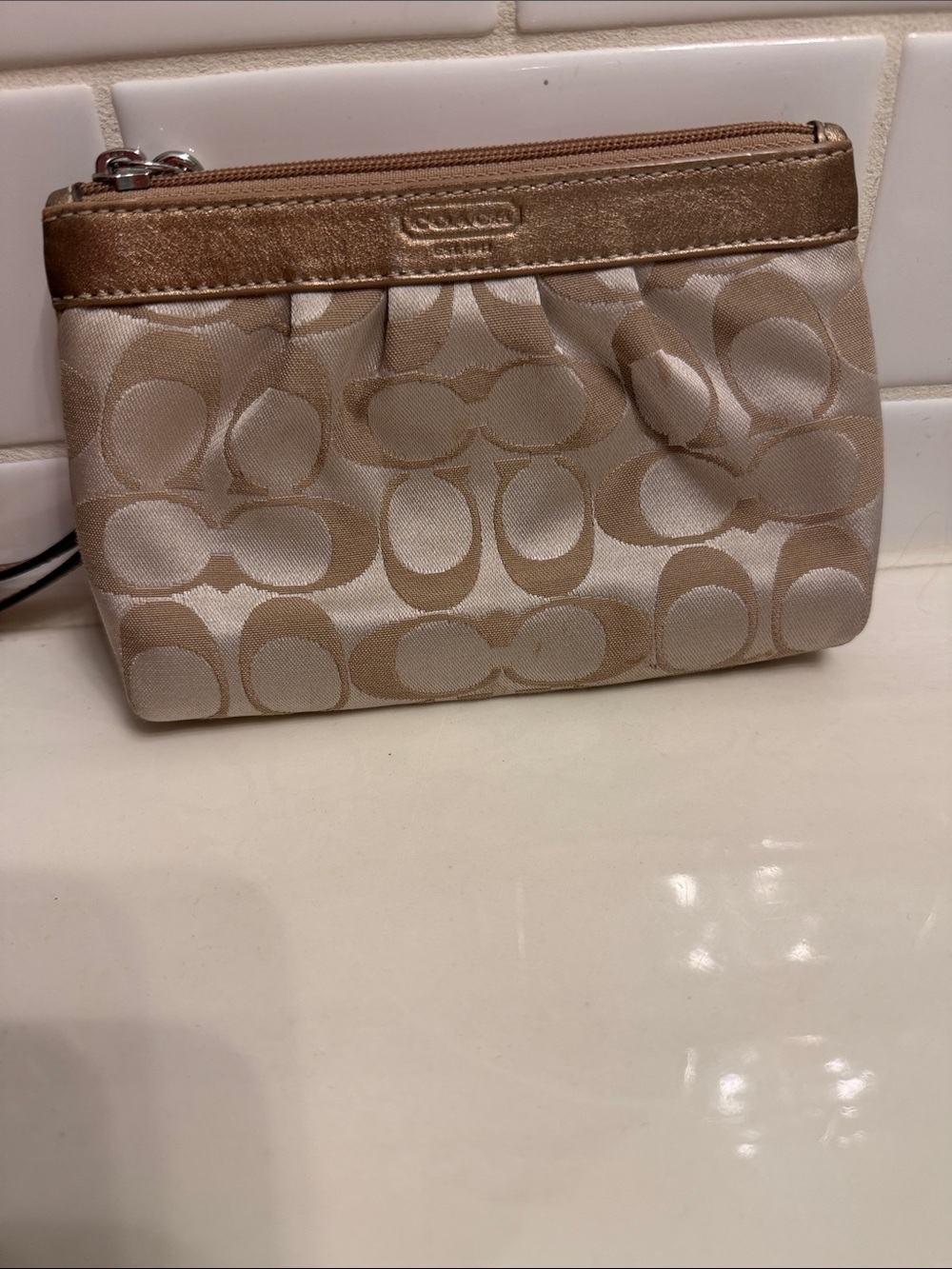 Coach Beige Signature Small Wristlet with Metallic Trim